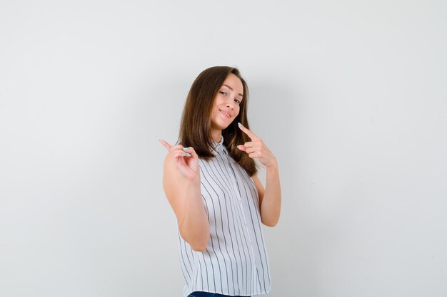 Expressive young lady posing in the studio