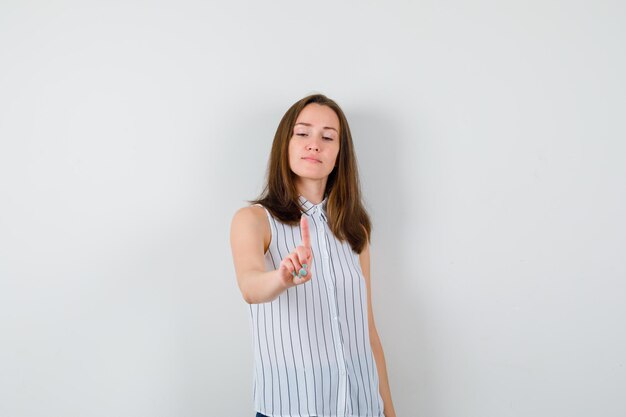 Expressive young lady posing in the studio