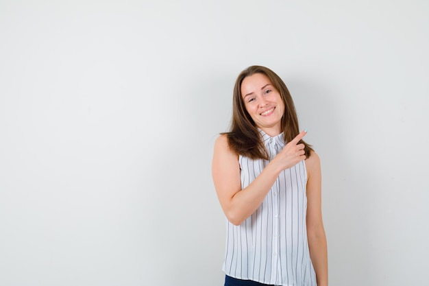 Expressive young lady posing in the studio