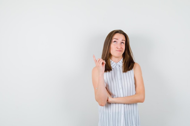 Expressive young lady posing in the studio