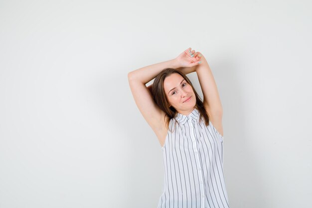 Expressive young lady posing in the studio