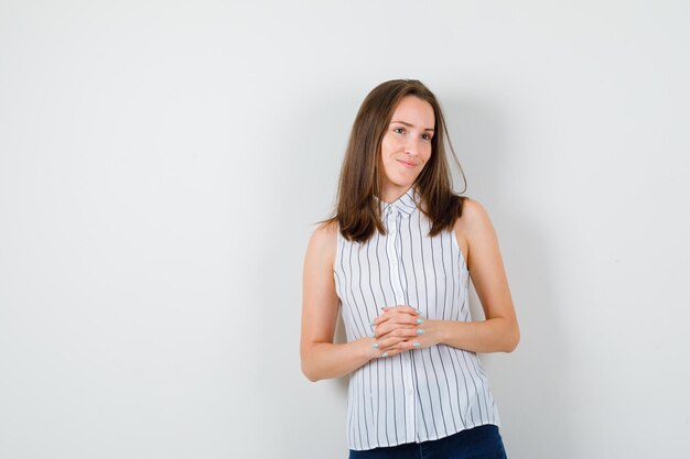 Expressive young lady posing in the studio