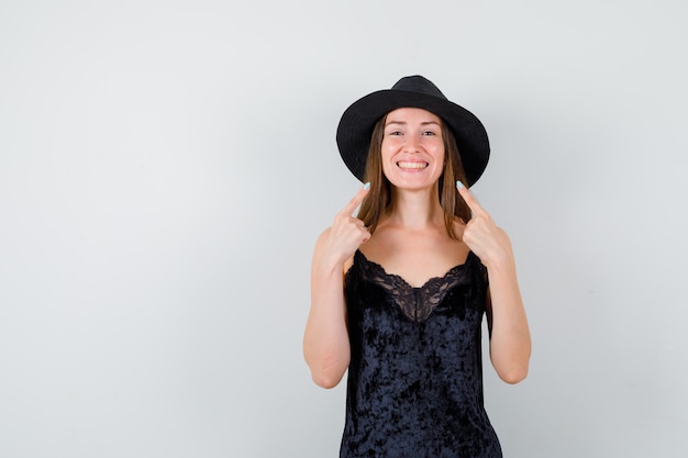 Expressive young lady posing in the studio