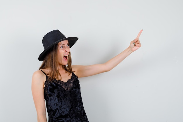 Expressive young lady posing in the studio