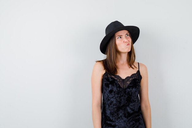 Expressive young lady posing in the studio