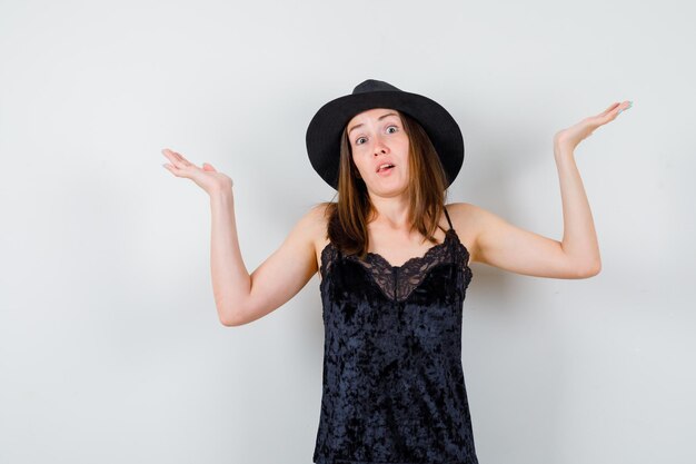 Expressive young lady posing in the studio