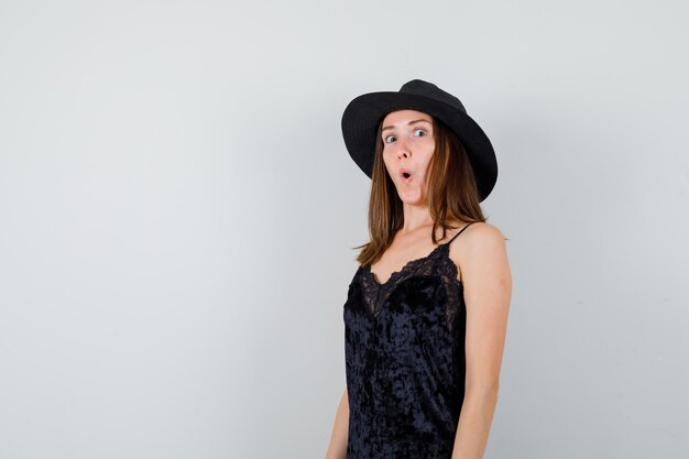 Expressive young lady posing in the studio