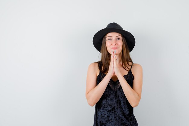 Expressive young lady posing in the studio