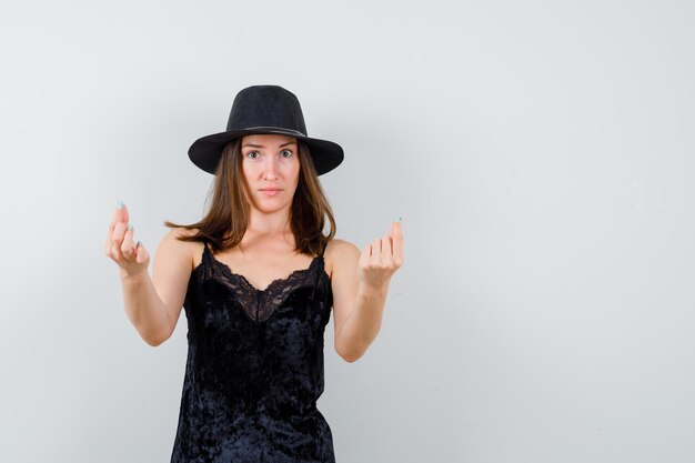 Expressive young lady posing in the studio