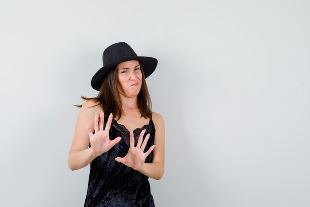 Expressive young lady posing in the studio