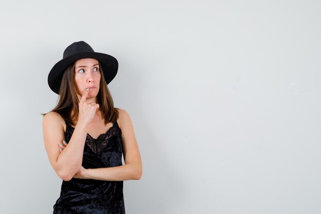 Expressive young lady posing in the studio