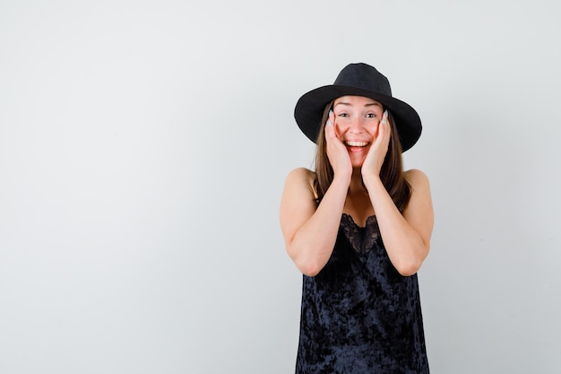 Expressive young lady posing in the studio