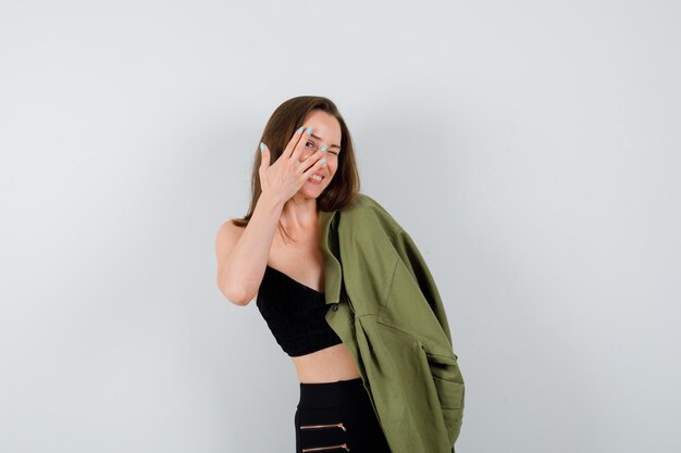 Expressive young lady posing in the studio