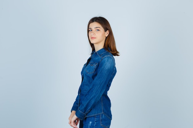 Expressive young lady posing in the studio