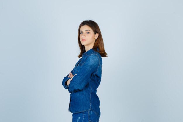 Expressive young lady posing in the studio