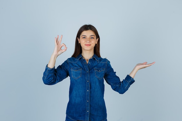 Expressive young lady posing in the studio