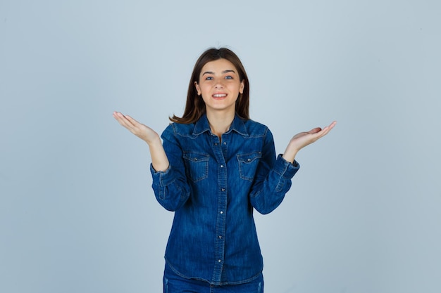 Expressive young lady posing in the studio