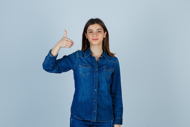 Expressive young lady posing in the studio