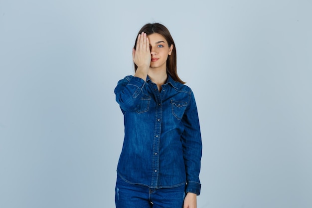 Expressive young lady posing in the studio