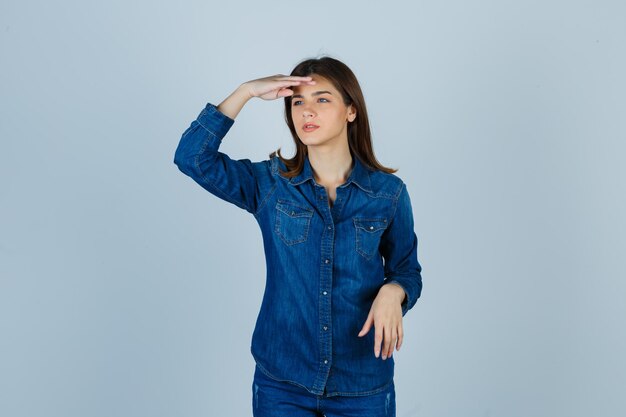 Expressive young lady posing in the studio