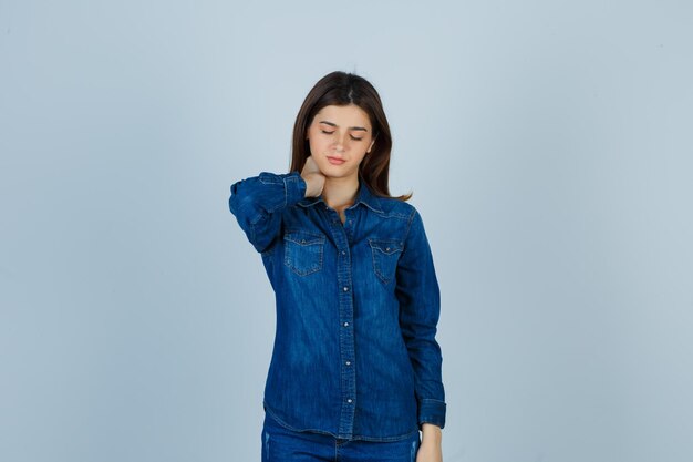 Expressive young lady posing in the studio