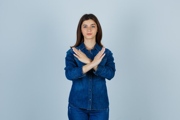 Expressive young lady posing in the studio