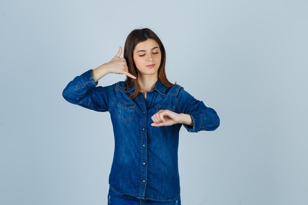 Expressive young lady posing in the studio