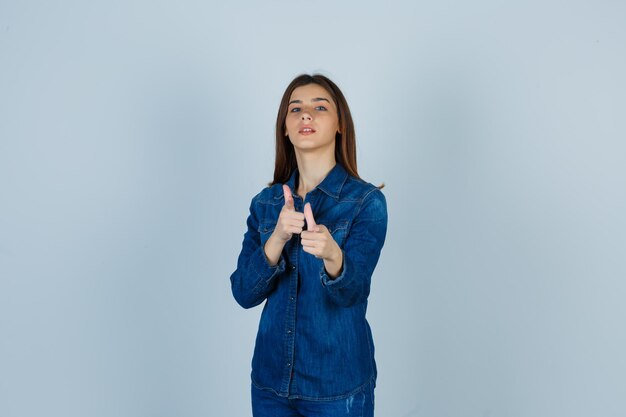 Expressive young lady posing in the studio