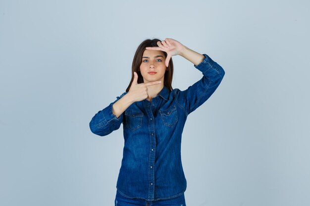 Expressive young lady posing in the studio