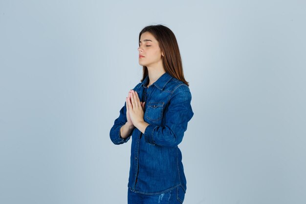 Expressive young lady posing in the studio