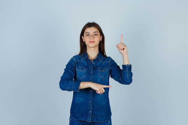 Expressive young lady posing in the studio