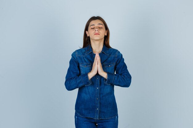 Expressive young lady posing in the studio