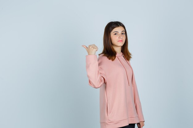 Expressive young lady posing in the studio