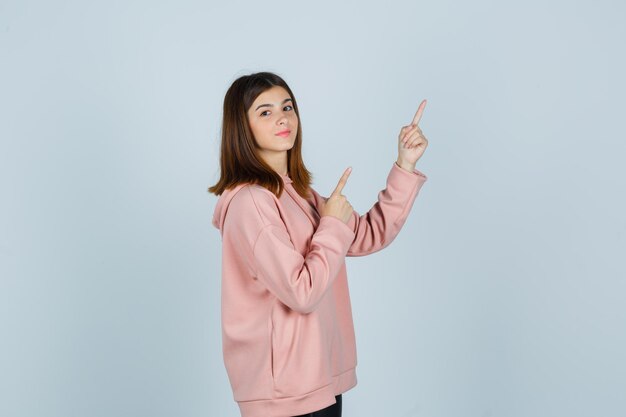 Expressive young lady posing in the studio