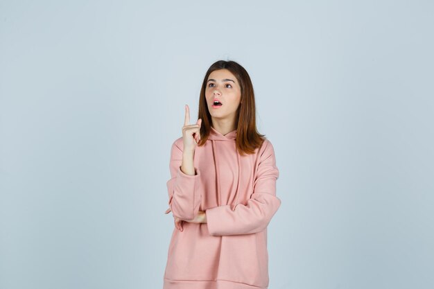 Expressive young lady posing in the studio