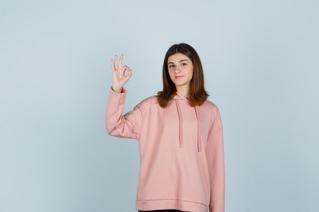 Expressive young lady posing in the studio