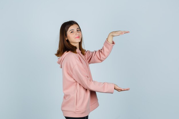 Expressive young lady posing in the studio