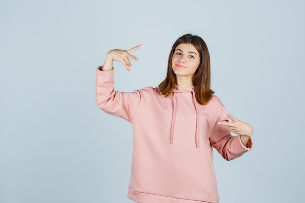 Expressive young lady posing in the studio