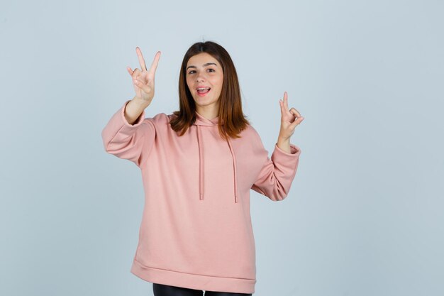 Expressive young lady posing in the studio