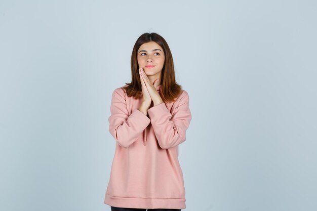 Expressive young lady posing in the studio