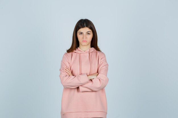 Expressive young lady posing in the studio