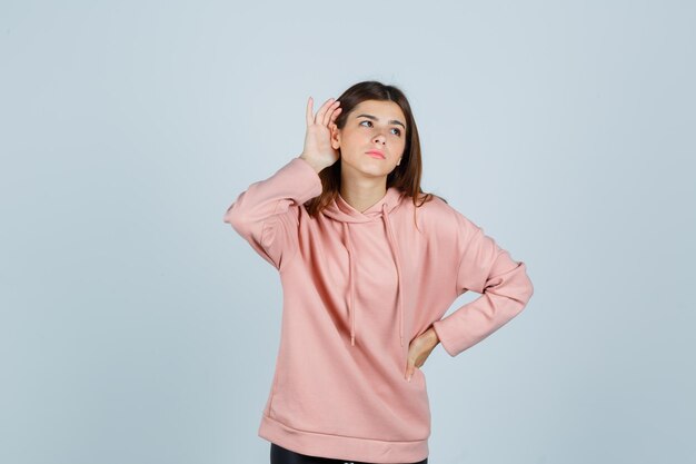 Expressive young lady posing in the studio