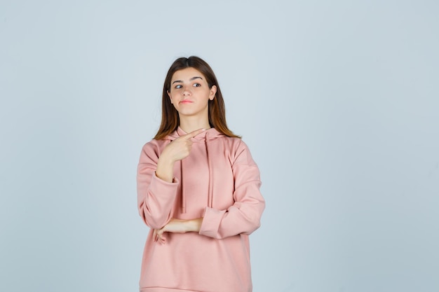 Expressive young lady posing in the studio