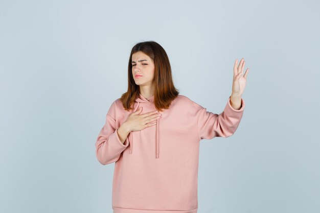 Expressive young lady posing in the studio