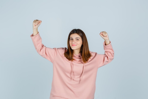 Expressive young lady posing in the studio