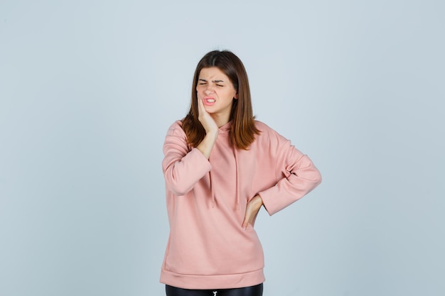 Expressive young lady posing in the studio