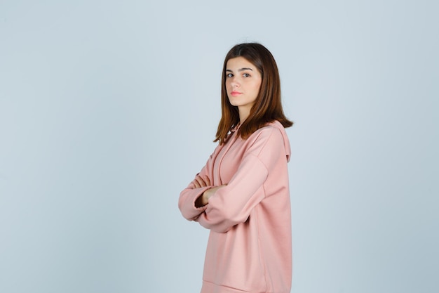 Expressive young lady posing in the studio