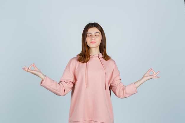 Expressive young lady posing in the studio