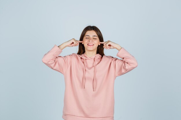 Expressive young lady posing in the studio