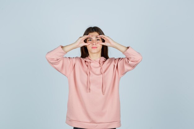 Expressive young lady posing in the studio